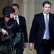 Michael Slager (right) walks from the Charleston County Courthouse under the protection of the Charleston County Sheriff’s Department after a mistrial was declared for his trial in Charleston, S.C., on Dec. 5. 2016. (Mic Smith/File/AP Images)